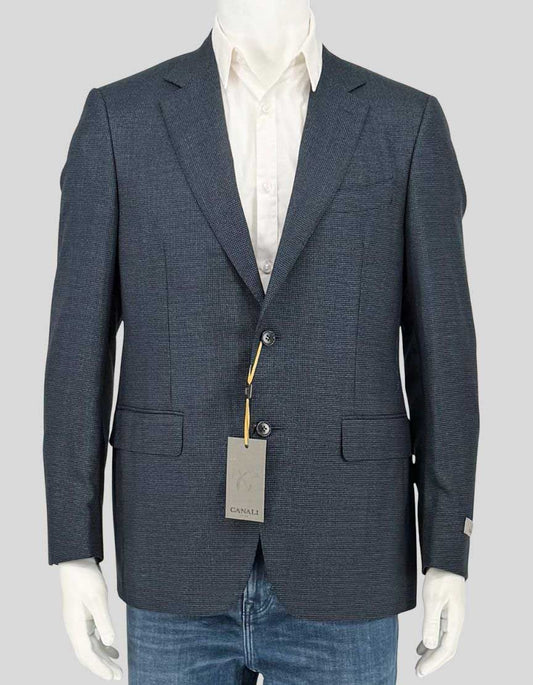CANALI navy wool blazer crafted in Italy with subtle birdseye texture. Two-button closure with notch lapels and Italian tailoring. 