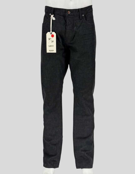 TODD SNYDER crafted these slim fit jeans from lightweight 100% cotton denim with a charcoal wash. Five-pocket styling with button fly, clean lines, and versatile dark grey color. 