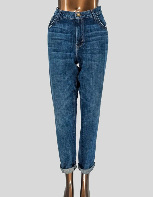 CURRENT/ELLIOTT The Fling boyfriend jeans in medium blue wash. Slim boyfriend fit designed to sit low on the hips with relaxed fit through thigh. Cropped ankle length with cuffed hem. Classic five-pocket styling with button fly closure. 