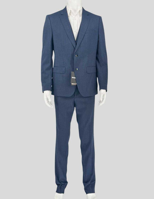 HUGO BOSS three-piece suit in Marzotto Italian virgin wool with stretch tailoring for comfort and breathability. Slim fit jacket features full lining, interior pockets, and dual vents. Four-button vest includes adjustable back strap. Flat-front pants with unfinished hem for custom tailoring.