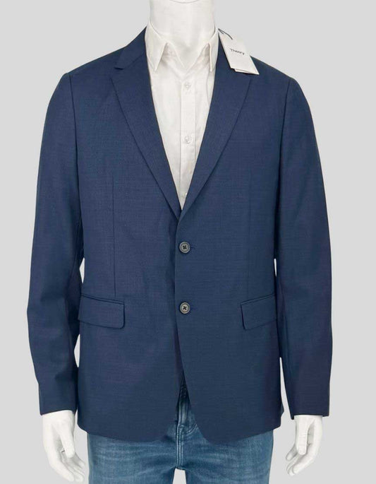 THEORY Clinton O blazer in Eclipse Multi textured weave with navy blue finish. Two-button front closure with notch lapels. Flap pockets at waist and interior chest pocket. Single back vent for ease of movement. Fully lined interior. Arrives new with all original tags attached.